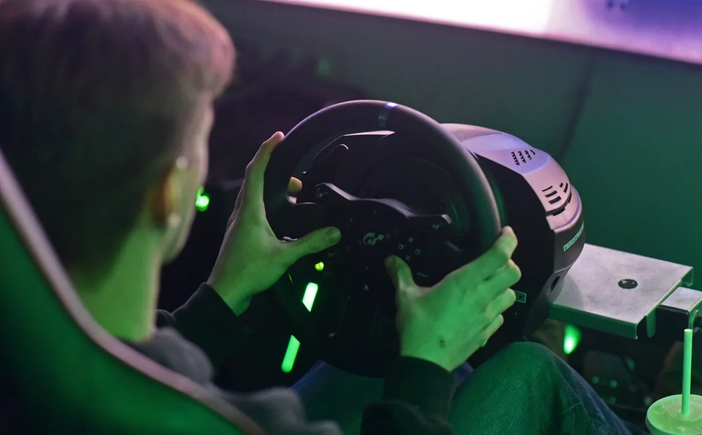 Hands on a racing sim wheel