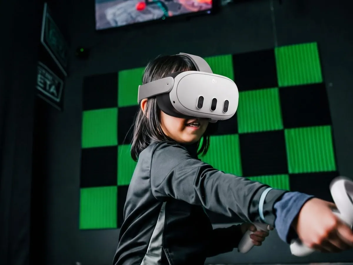 A kid in a VR headset reaching out mid-game