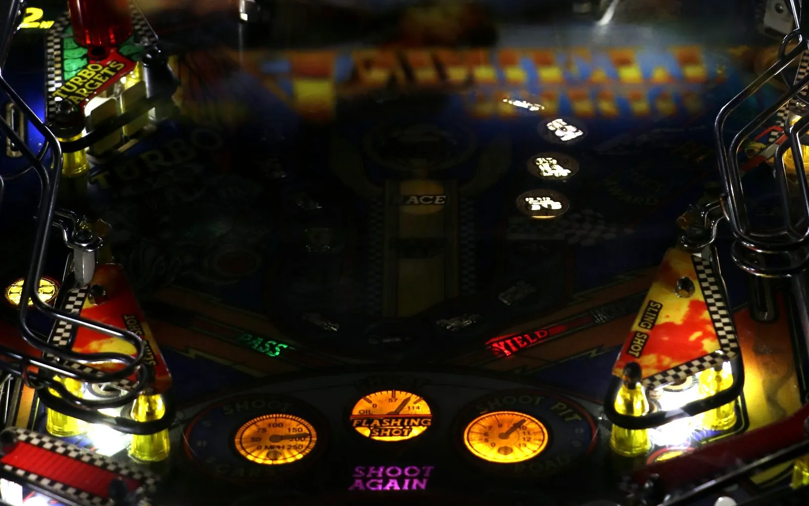 The lit playfield of the Mario Andretti pinball table