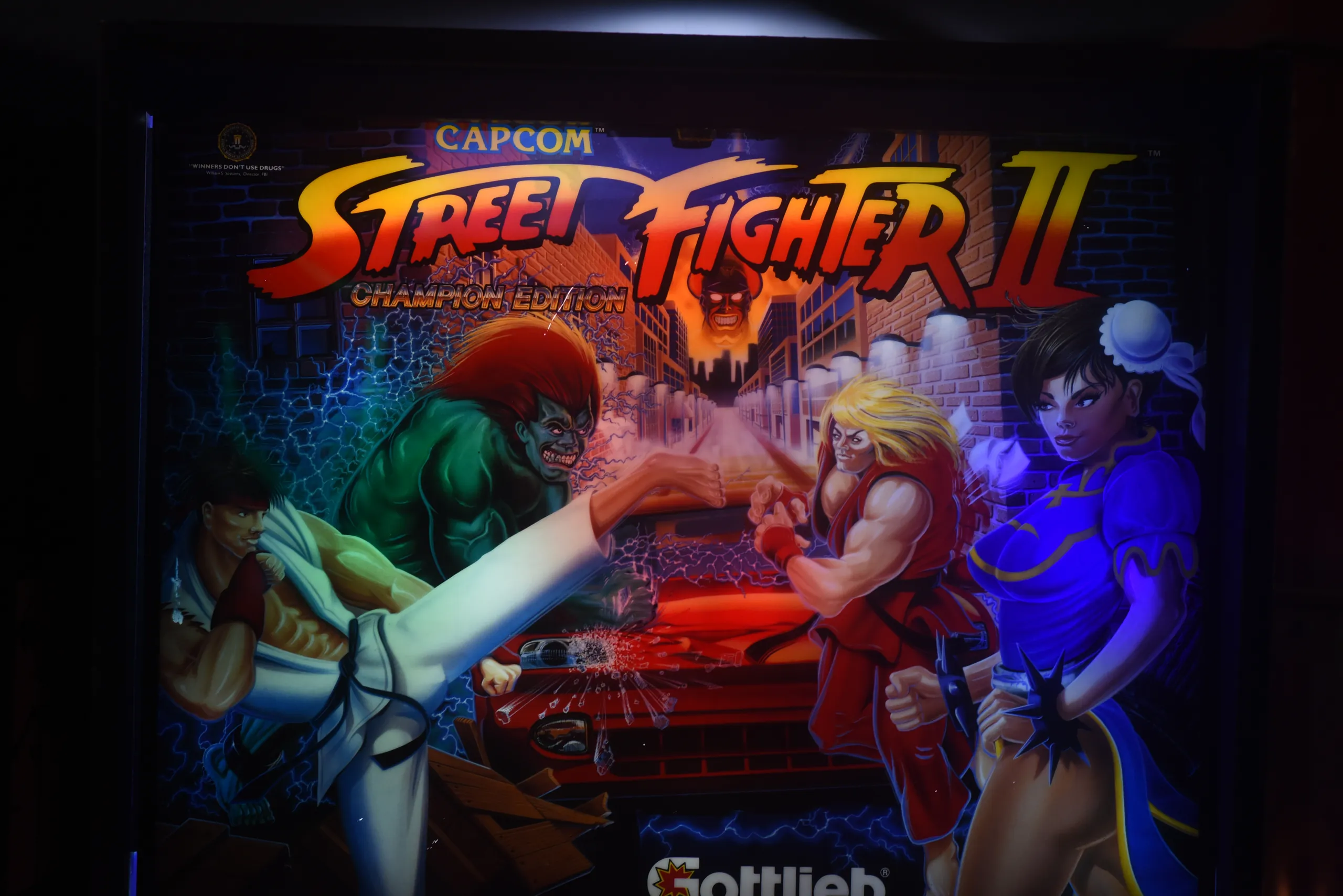 Street Fighter II pinball backglass with Ryu, Ken and Chun-Li
