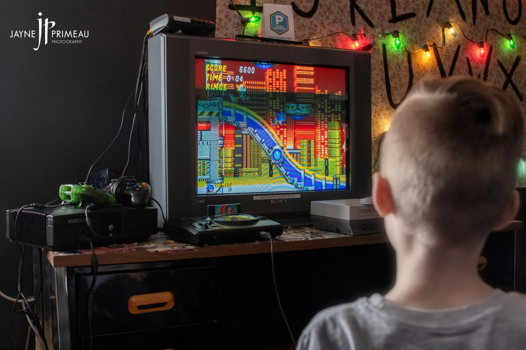 A young guest playing Sonic on a retro CRT