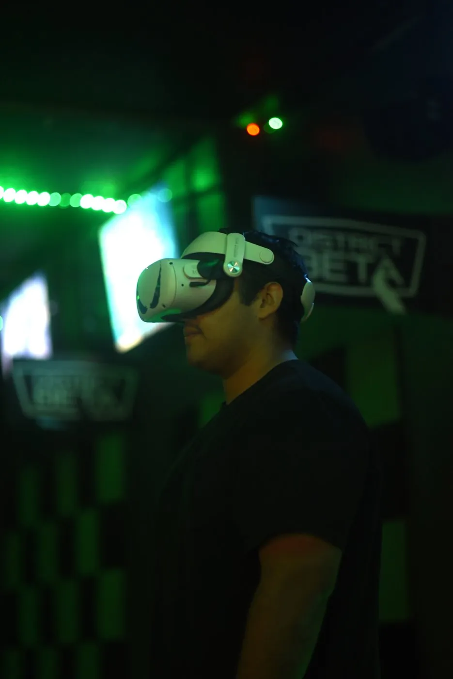 A player in a VR headset in one of our private chambers