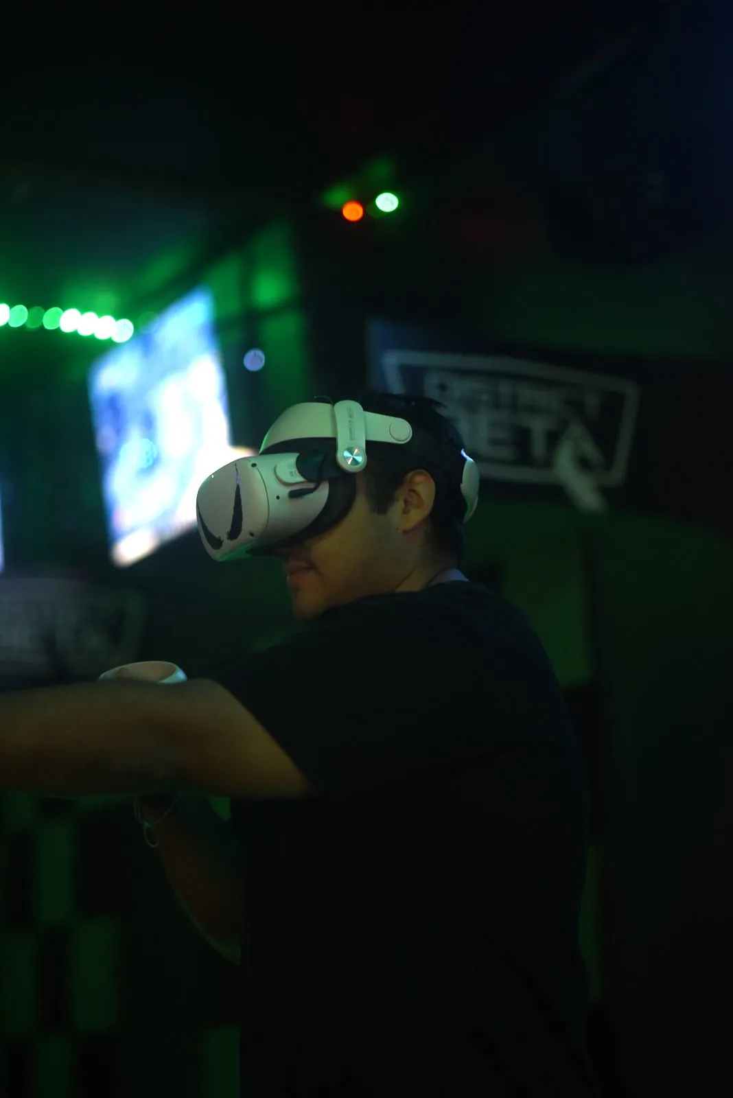 A player reaching out with VR controllers
