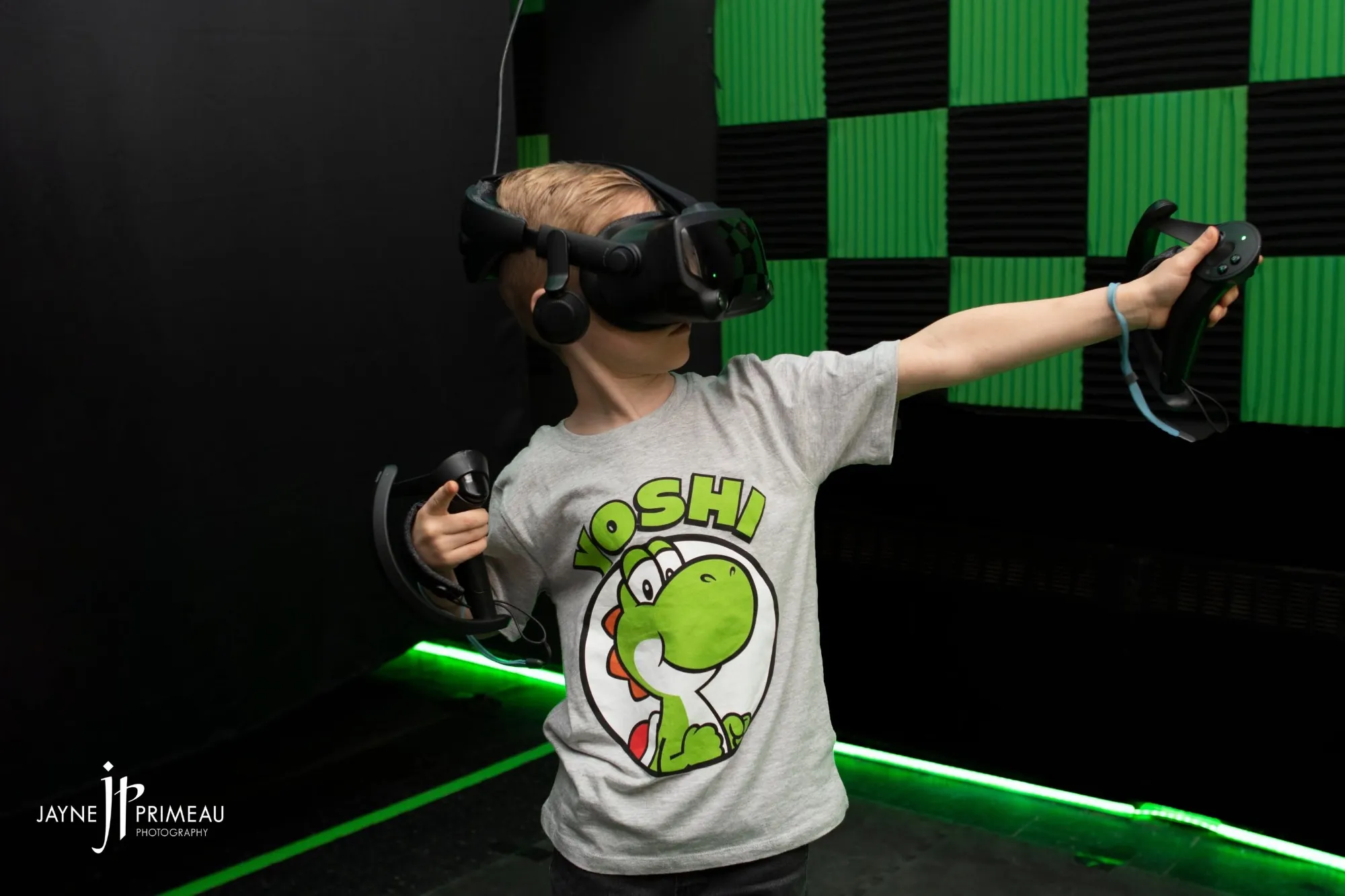 A kid playing in a VR headset
